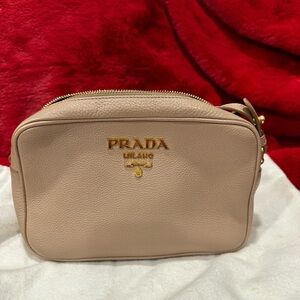 Prada tan with gold hardware crossbody bag. Great condition no marks or scuffs